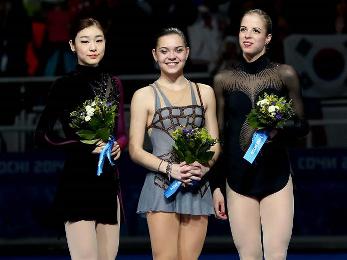 Russia’s Adelina Sotnikova wins a gold medal while Georgia’s Elene Gedevanishvili ranks 19th in women’s figure skating competition at Sochi Olympics  