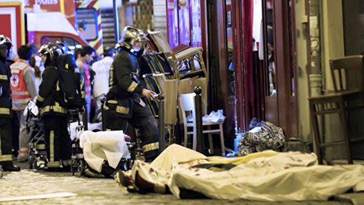 At least 100 killed in theatre as terror attacks hit Paris