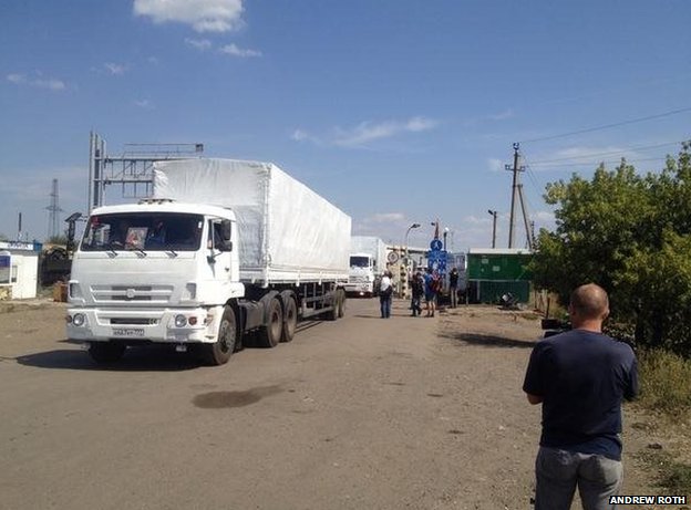 Russian aid convoy moves across border into Ukraine