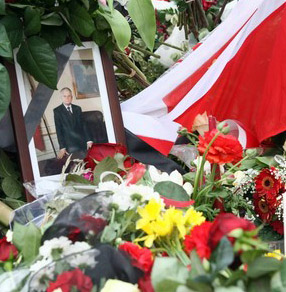 Georgian citizens gather outside Polish embassy to express their condolences