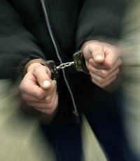 Man arrested in suspicion of bribery