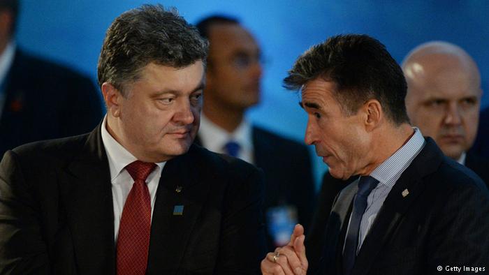 Ukraine`s Poroshenko optimistic on Minsk talks, NATO members mull more sanctions