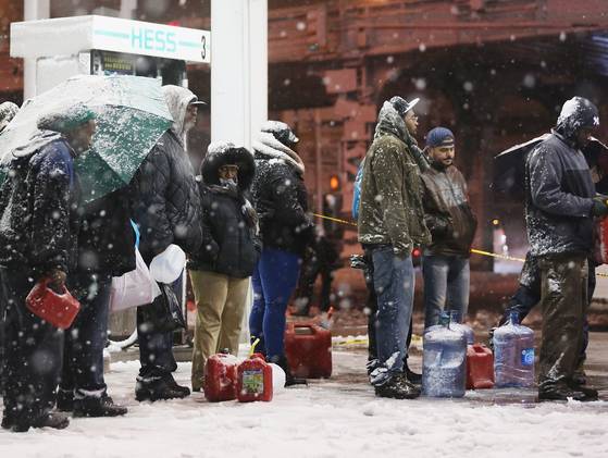 Fuel rationed as winter storms follow Superstorm Sandy